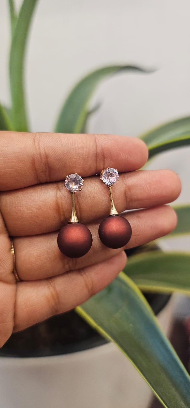 img 20251028 wa0641 Deep Maroon Pearl Drop Earrings with Crystal Stud and Gold Tone Detail