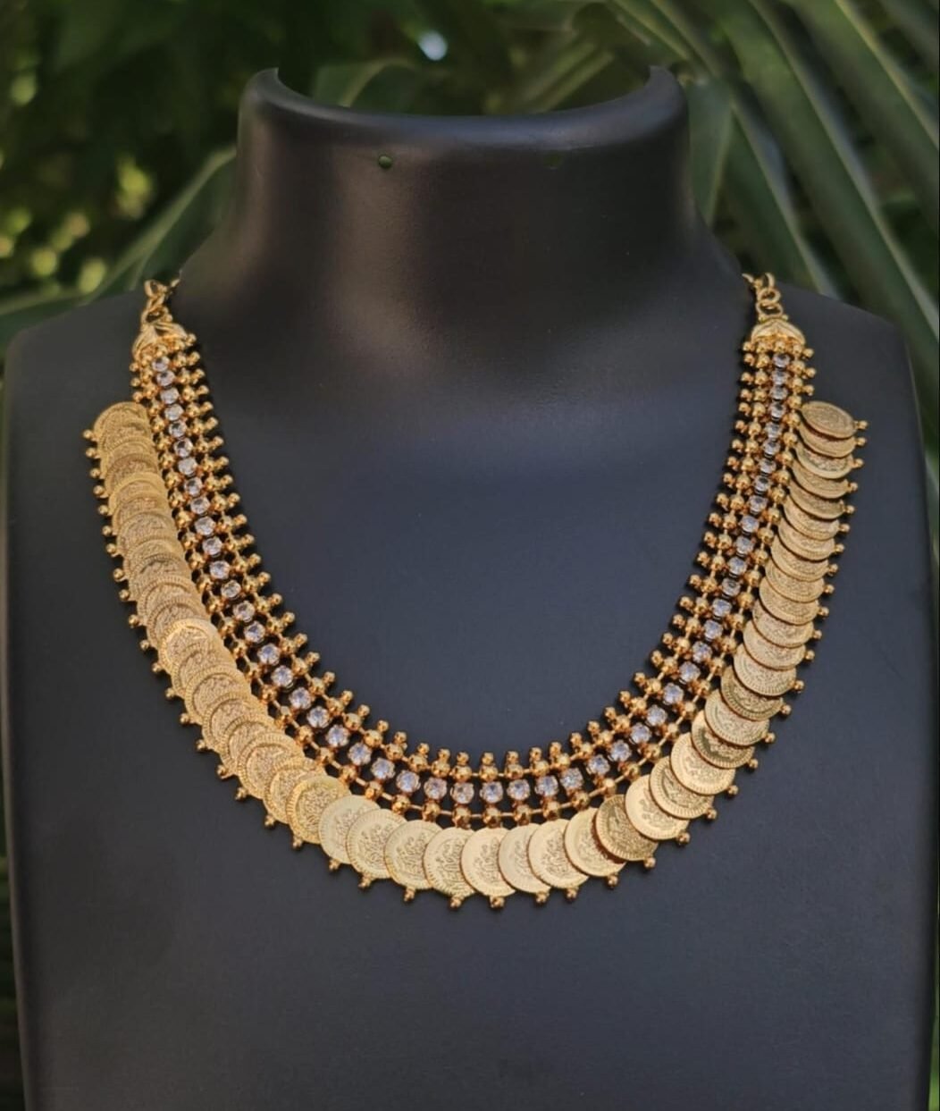 img 20251028 wa0648 Traditional Gold Plated Coin Layer Necklace with White Stone Detailing
