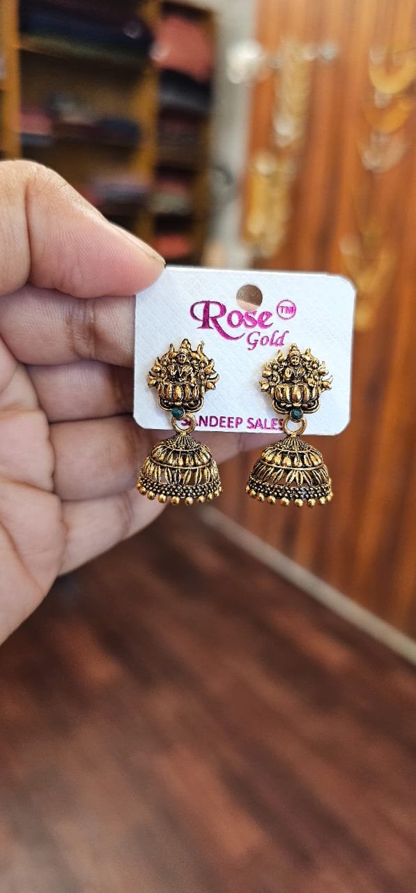 Antique Gold Lakshmi Jhumka Earrings – BH06DA Antique Gold Lakshmi Jhumka Earrings with green stone BH06DA from MRJA Vastrahara
