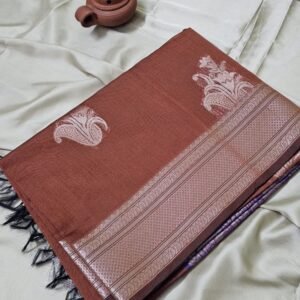 Folded rust brown pure handloom silk cotton saree displaying floral woven buttas and rich woven zari border - MHP34 MRJA Vastrahara